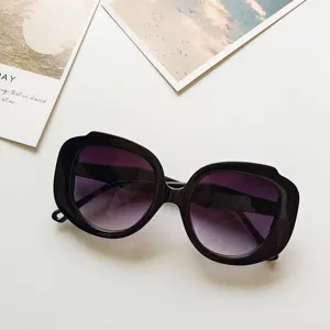 Chic oversized round sunglasses for women, Korean style black frame with gradient lenses.