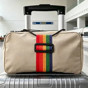 Travel luggage bag with colorful striped fixing strap for convenient outdoor trips.