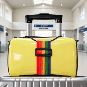 Detailed view of colorful rainbow elastic luggage strap and travel bag for secure packing.