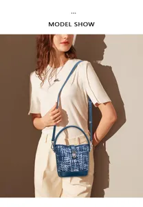 Close-up shot of the woven denim bucket bag, showcasing intricate texture and stylish details.