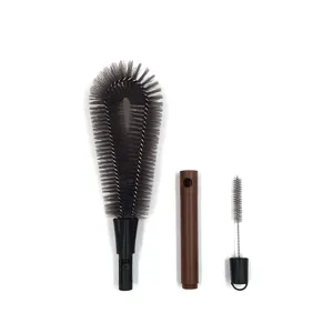 Detail view of the multi-functional cleaning brush set with detachable brush heads and ergonomic handle.