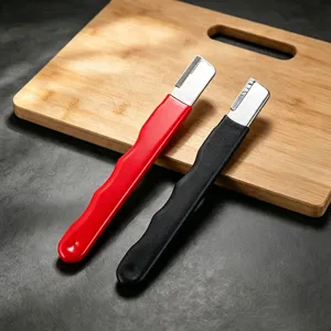 Handheld knife sharpener tool with red and black handles for kitchen scissors and blades.