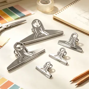 Stainless steel bulldog binder clips set, detail view of metal stationery paper clamps.