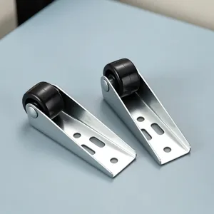 Detail view of metal bracket black guide rollers, ideal for sliding and support applications.