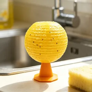 Detail van fruitvliegjes vanger gele bal en basis voor het vangen van kleine insecten.
