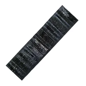 Detail view of the strong sticky mouse trap mat, effective black rat glue pad for home pest control.