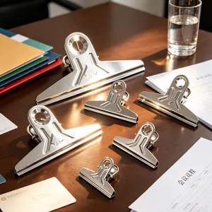Heavy duty stainless steel binder clips assorted sizes detail view for office organization.