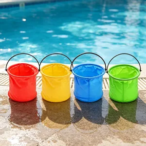 Detailed view of four colorful collapsible folding buckets placed neatly by the pool edge.