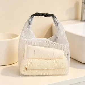 Detail shot of portable waterproof mesh toiletry bag, breathable design for travel and gym use.