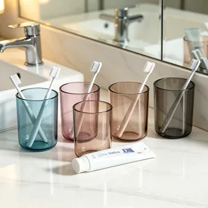 Transparent plastic toothbrush cups set, colorful modern gargle mugs for bathroom home.