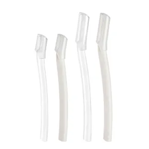 Detailed closeup of white facial hair removal razors with safety caps for precise eyebrow trimming.