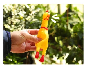 Classic yellow rubber screaming chicken pet toy, funny squeaking vent toy for dogs and cats.