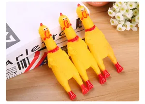 Rubber screaming chicken pet toy detail view, funny squeaky chewing interactive toy for dogs.