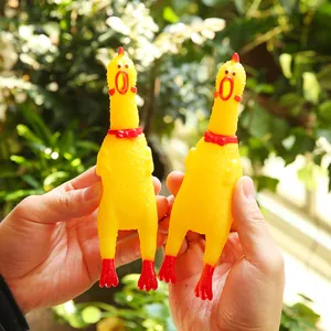 Funny yellow rubber screaming chicken pet squeaky toy for fun and stress relief games now.
