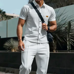 Men casual waffle knit short sleeve shirt and pants set stylish solid color outfit.