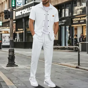 Men's waffle knit short sleeve button down shirt and casual loungewear pants set detail view.