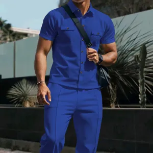Detailed view of mens blue waffle knit short sleeve shirt and casual pants two piece set.