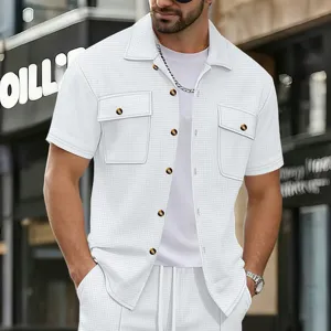 Men's casual white waffle short-sleeve shirt and pants set featuring button-up design.