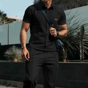 Detailed view of men's casual waffle short sleeve shirt and pants set in solid black color.