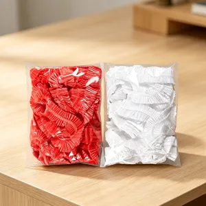 Details zu Einweg-elastischen Tischdecken in Rot und Weiß, saubere Plastiktüten.