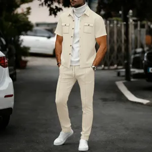 Detailed view of the men's casual waffle knit short sleeve shirt and pants set outdoors.