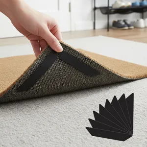 Detail view of triangular carpet anti-slip stickers showing application and placement.