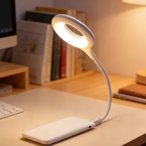 USB powered white LED desk lamp with flexible gooseneck and ring light head on study table.
