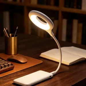Detailed view of white flexible ring desk lamp with adjustable gooseneck for study or bedroom.