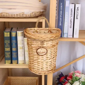 Rustic wicker hanging storage basket detail, hand-woven wall decor flower holder for home.