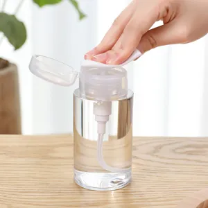 Clear plastic press dispenser bottle for cosmetic lotion and makeup remover travel main view