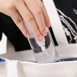 Clear travel spray bottle for cosmetics, portable empty dispenser for lotion and makeup.