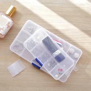 Clear plastic jewelry storage box with compartments, multi-grid portable pill and earring organizer