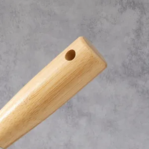 Wooden handle cleaning tool scraper detail with convenient hanging hole for home bathroom use.