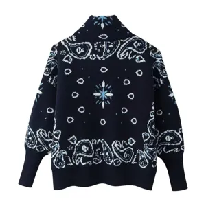 Women vintage jacquard knit cardigan back detail, stylish blue zip sweater with paisley pattern.