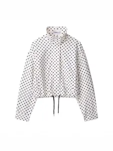 Stylish women's black and white polka dot stand collar casual jacket with drawstring hem.