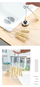 Detailed view of multi-sized stainless steel cleaning brushes for narrow spouts and straws.
