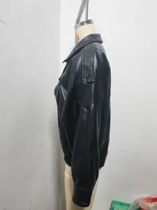 Side view of a black faux leather jacket with double collar, perfect for women's autumn streetwear.