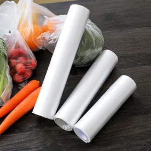 Transparent disposable plastic food storage bags in rolls, tear-away household fresh keeping bags.