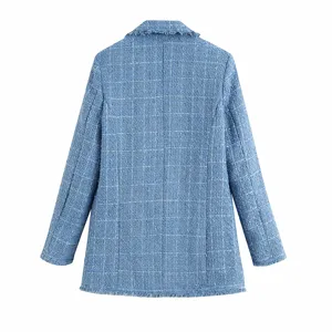 Detailed back view of a blue tweed blazer jacket, showing textured fabric and stylish frayed hem.