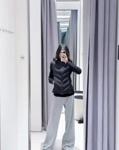 Women's slim-fit lightweight hooded padded jacket, stylish black spring coat daily wear.