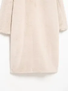 Chic beige faux fur long coat for women, elegant winter outerwear with cozy loose fit style.
