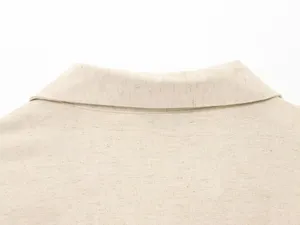 Linen blend top detail, collar back view, clean white background product photography.