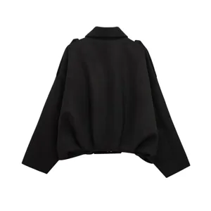 Black short jacket back detail showing classic collar and hem design for women apparel.
