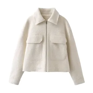 Textured off-white wool jacket featuring lapel collar, zip front and dual chest pockets.