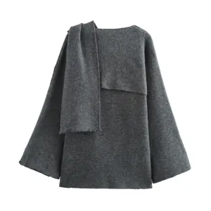 Grey asymmetric knit jacket detail, stylish draped scarf design, modern short outerwear.