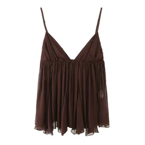 Detail view of the chic brown sheer camisole featuring delicate straps and ruffle hem.