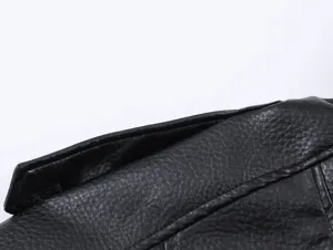 Black lychee leather jacket detail close-up, stylish winter casual stand collar coat.