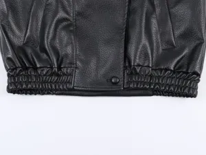 Black lychee pattern leather jacket detail view, stylish casual winter outerwear for women.