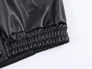 Black leather jacket detail, premium lychee texture, stylish winter streetwear outerwear.