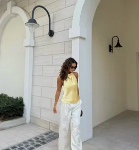 Silk texture halter sleeveless crop top detail view, elegant summer women apparel.
